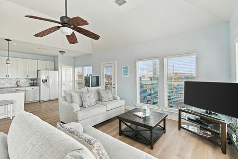 Living room with a view into the kitchen