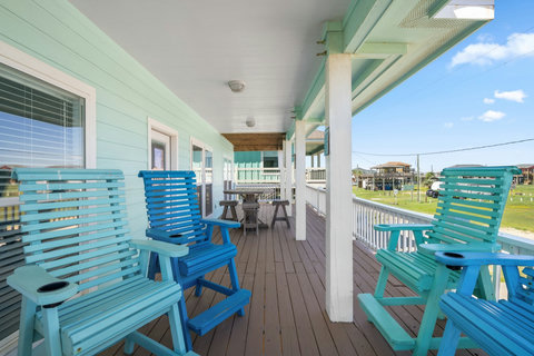 Colorful tall chairs on the covered deck
