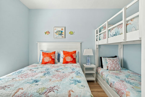 Bedroom with a full bed plus a twin-over-twin bunk