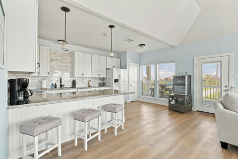 Kitchen bar with three stools