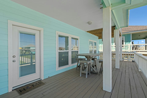 Front door opens to the covered deck