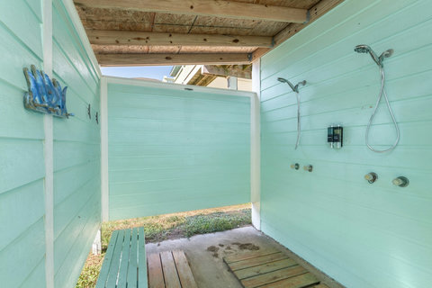 Outdoor shower to rinse off the sand