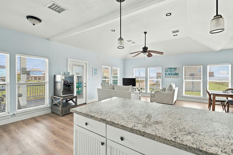 Kitchen island with views of the whole room