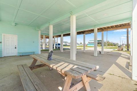 Picnic table in the shade under the house