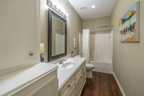 Hall bath with a tub-shower