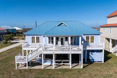 Front deck, stairs and shaded patio below