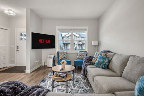 Main Floor Living Room /w Portable AC & Smart TV
