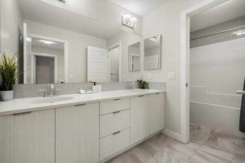 Full bathroom luxury, his and hers sinks. Each stay comes with boxes of tissue, cotton pads, Q-tips, extra toilet paper.
