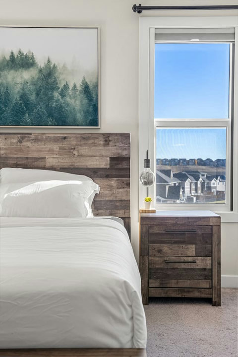 Luxurious, one of a kind master bedroom with california king mattress , duvet and complete towel sets.