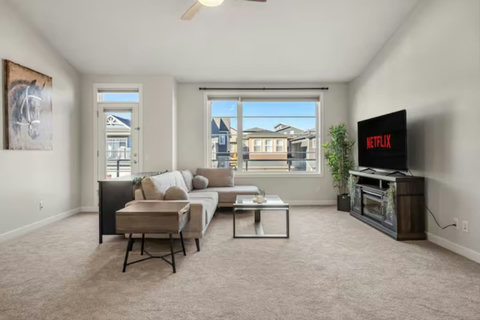 Spacious and modern bonus room with abundant natural ligh, 65" Smart TV with Netflix to enjoy your favourite shows, movies  and more!
