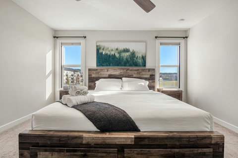 Luxurious, one of a kind master bedroom with california king mattress , duvet and complete towel sets.