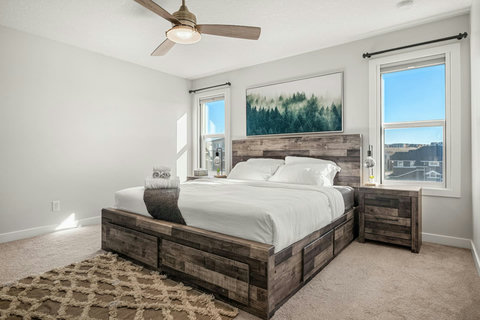 Luxurious, one of a kind master bedroom with california king mattress , duvet and complete towel sets.