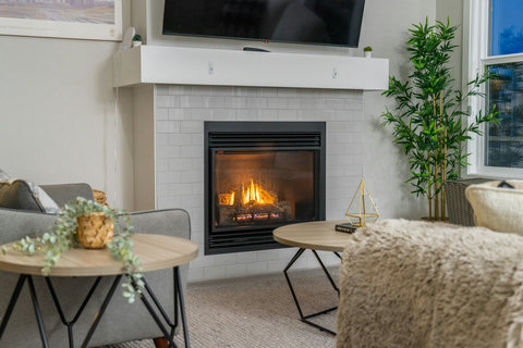 Cozy, luxurious & modern living room with a placce for everyone to connect, 65" Smart TV with Netflix shows, movies and more!