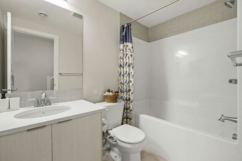 Full size bathtub with bidet toilet. Complimentary shampoo, condition and body wash.