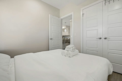 Beautiful cozy bedroom with quality mattress, duvet and complete towel sets.