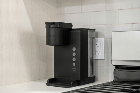 Fully equipped kitchen with knife set, keurig coffee machine (coffee pods included), tea, electric kettle, dishwasher, and more!