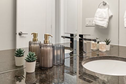 Full Bathroom equipped with complementary Q-Tips, facial tissues, make up removal cloth and full bathtub