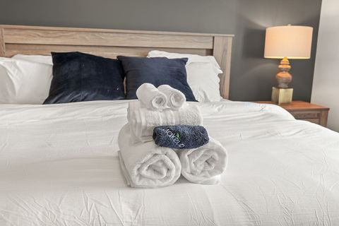 Luxurious king bed, large walk in closet & private in-suite bathroom