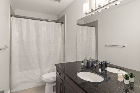Full Bathroom equipped with complementary Q-Tips, facial tissues, make up removal cloth and full bathtub