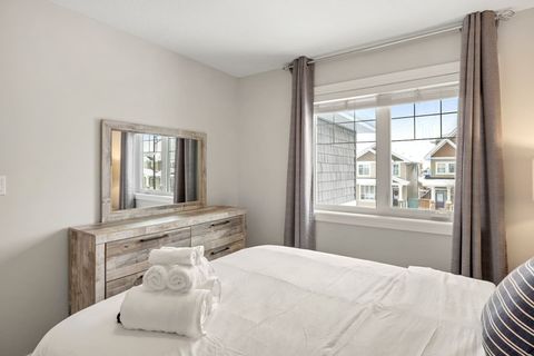 Drift off in comfort with our double bed, outfitted with fresh, plush bedding and accented by modern dimmable night lamps.