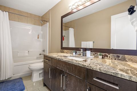 Full Bathroom equipped with complementary Q-Tips, facial tissues, make up removal cloth and full bathtub