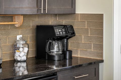 Fully-equipped kitchen, boasting a Air Fryer, modern appliances, and a coffee machine for your morning brew.