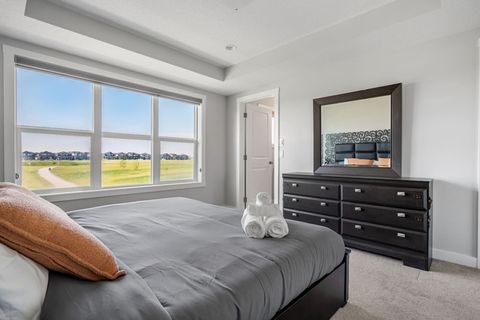 Best Of Comfort And Convenience In Our Master Bedroom, With a Dresser Equipped with Large Mirror