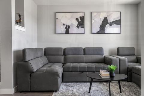 Relax On Our Spacious Long Sofa and Sofa bed, Perfect For Cozy Gatherings And Making Memories
