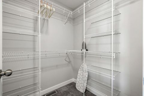 Master Bedroom Closet, Equipped with Plenty of Shelves for your Convenience