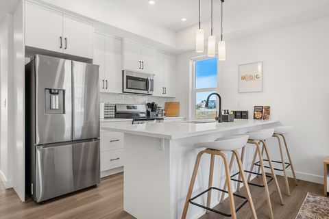 Step into a brand-new, modern kitchen fully stocked for your convenience. It features a seasoning kit, a premium knife set, and a Keurig machine with complimentary coffee pods. You’ll have everything you need to cook and enjoy your meals in style, with ad