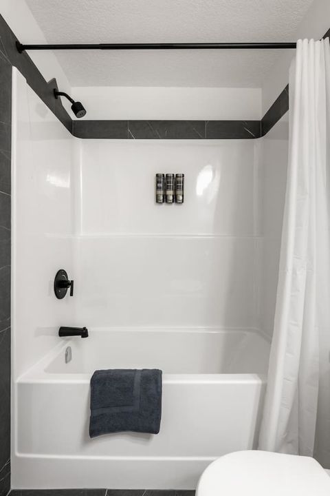 Indulge in the comfort of two full-size bathrooms, thoughtfully stocked with luxury plush bath, hand, and makeup towels. We also provide essential items like cotton pads, Q-tips, toilet paper, and a hairdryer. For your convenience, enjoy our quality and h