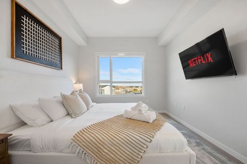 55" Smart TV with Netlix in the Master Bedroom. King size bed and an ensuite bathroom.