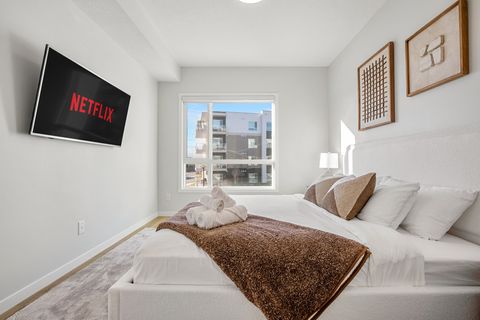 55" Smart TV with Netlix in the Master Bedroom. King size bed and an ensuite bathroom.