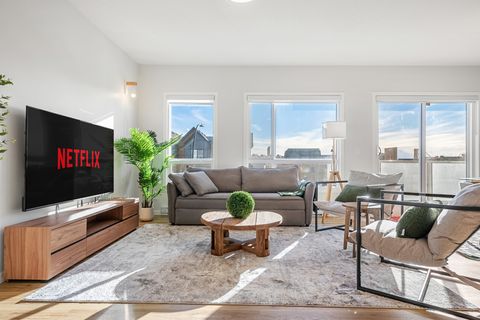 This 2 Bedroom + Queen Sofa Bed offers tons of natural light.