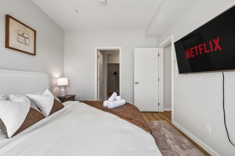 55" Smart TV with Netlix in the Master Bedroom. King size bed and an ensuite bathroom.