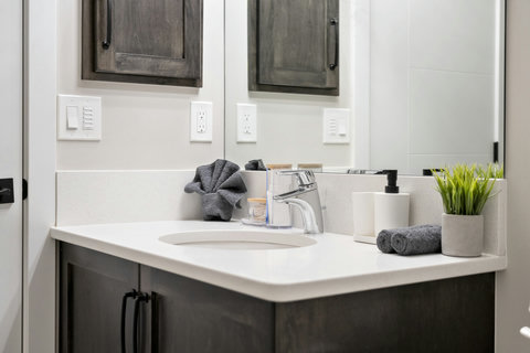 Sleek master bathroom with ample counter space and modern fixtures