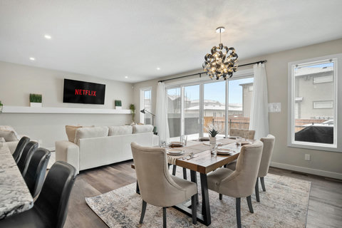 Bright open-concept living and dining area perfect for entertaining guests