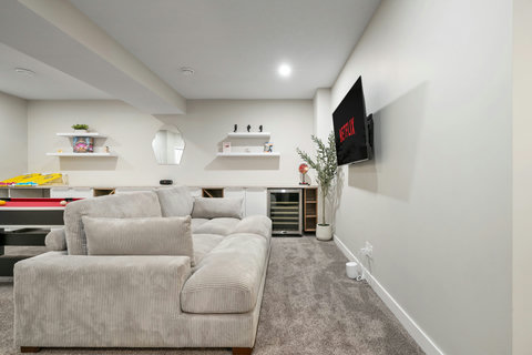 Relax in your own private media room with plush seating and entertainment options.