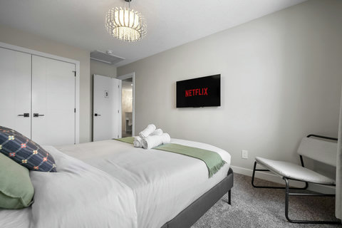 Comfortable guest bedroom perfect for streaming your favorite shows