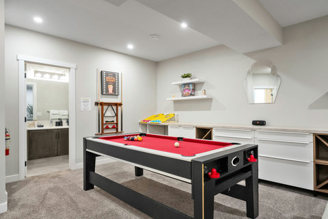 Spacious game room perfect for family fun and entertainment
