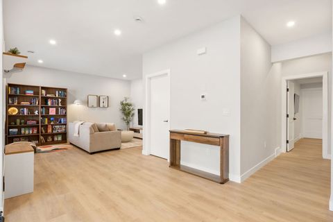 Large living area with small library and books for your kids to enjoy!