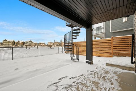 Expansive winter waterfront deck overlooking the lake and neighborhood