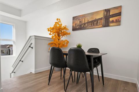 Black Dining Area with Sleek Furnishings, Creating an Elegant Setting for Memorable Meals and Gatherings