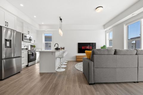 Unwind on the Comfy Sofa Bed in Front of a 65" Smart TV, Complete With Netflix for your Entertainment