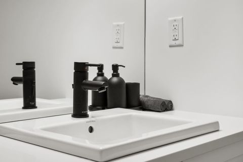 Modern Bathroom Sink, Equipped with Handsoap and Makeup Towels