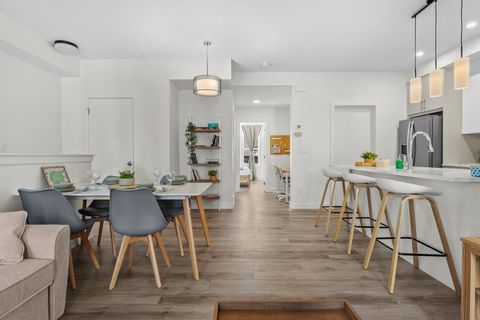 Bright and spacious open-plan living area with modern kitchen and dining