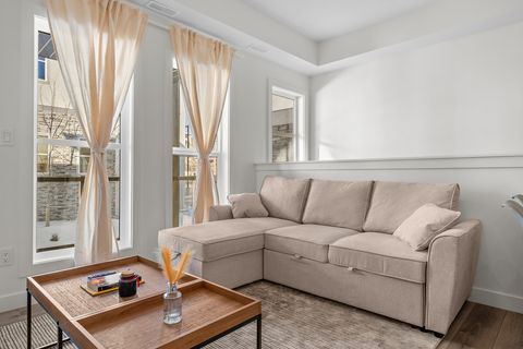 Comfortable living space with natural light and modern furnishings