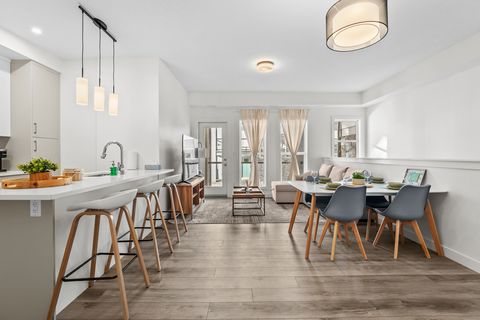 Spacious open-concept living area with modern finishes and natural light