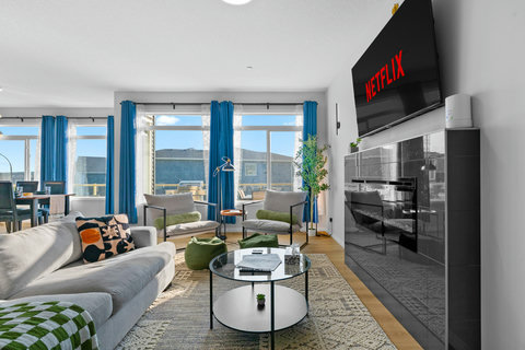 Large Cozy Living Room with 65" Smart TV