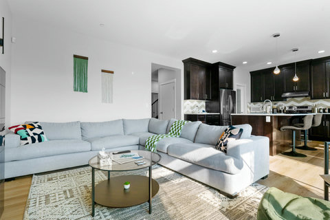 Large Cozy Living Room with Fireplace & 65" Smart TV